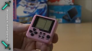The Tiny Pink Brick Game / China 9999 in 1 Multi Game Handheld