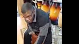 Terrance Shider playing the cajon
