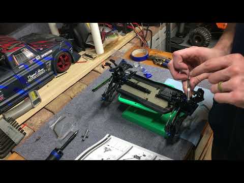 Building a Team Associated B74.1d 4WD Buggy Ep 7: Steering Knuckles, Hubs, Axles, Steering Links