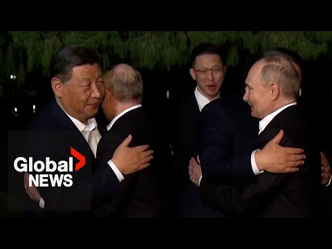 Xi hugs Putin as Russia-China talks sealed with rare show of affection