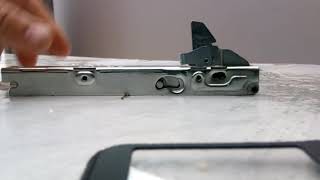 Releasing oven door hinge that has snapped into closed position