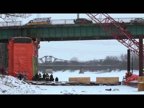 Woman dead after car plunges over Disraeli bridge