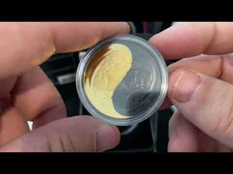 Royal Canadian mint 1 oz gold plated coin black and gold the sea otter