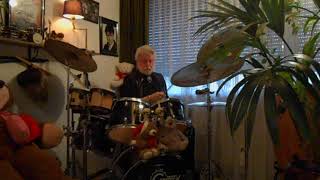 Johnny Drumt met Eric Clapton Merry Christmas Baby Blues.