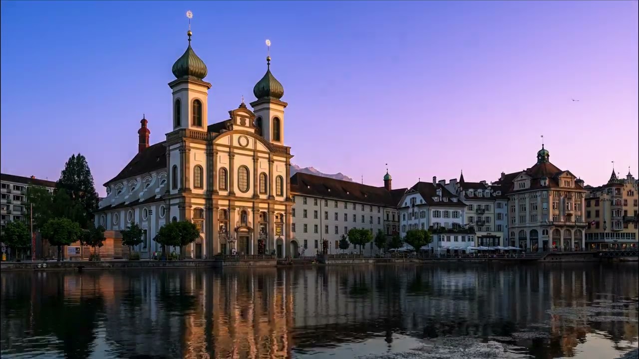 Experience the captivating timelapse of Lucerne's majestic Jesuit Church.