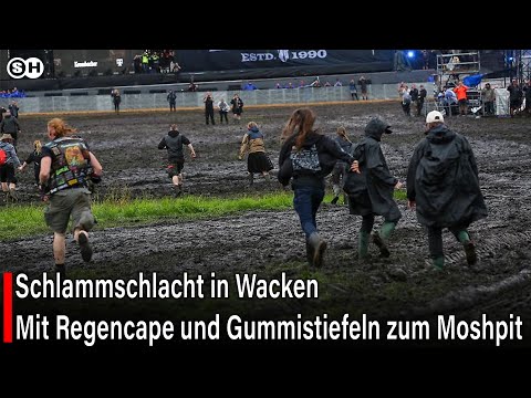 Schlammschlacht in Wacken  Mit Regencape und Gummistiefeln zum Moshpit #germany #news