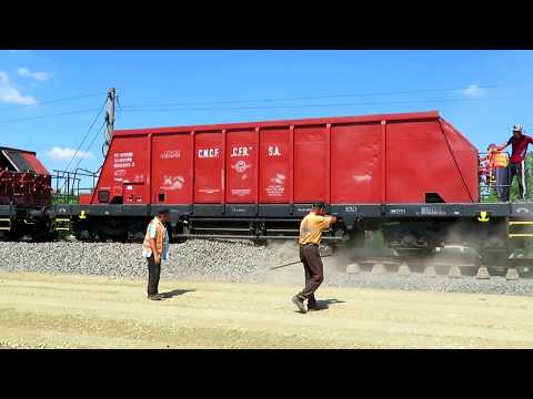 Descărcare piatra sparta din vagoane de tip FACCPPS la Km 11 pe linia CF 700, 18.05.2018