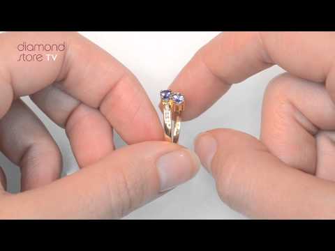 E4917 - Tanzanite 0.30CT And Diamond 9K Gold Ring