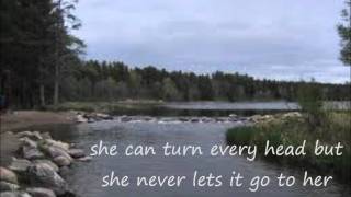 Tim McGraw- She Never Lets it Go to Her Heart lyrics