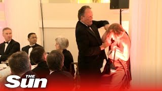 Tory MP grabs Greenpeace activist by her neck | Mark Field MP
