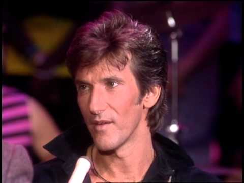 Dick Clark interviews John Cafferty and the Beaver Brown Band- American Bandstand 1984