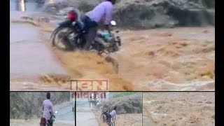 A Bike Rider swept away by rain swollen river in Madhya Pradesh