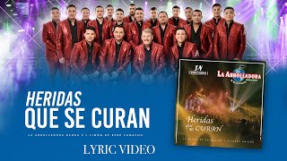La Arrolladora Banda El Limón de René Camacho - Heridas Que Se Curan &quot;En Concierto&quot; (Lyric Video)