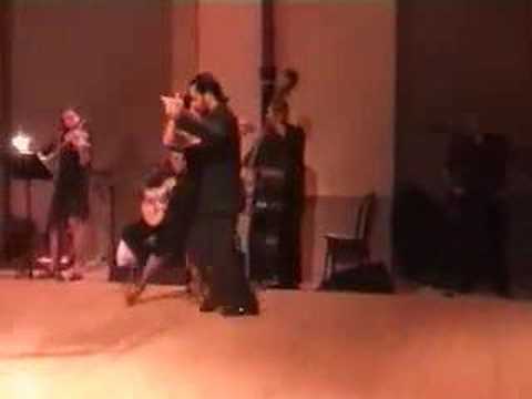  Ezequiel Paludi  and  Geraldine Paludi  are  dancing  to  the  tango  "  La Cachila  "