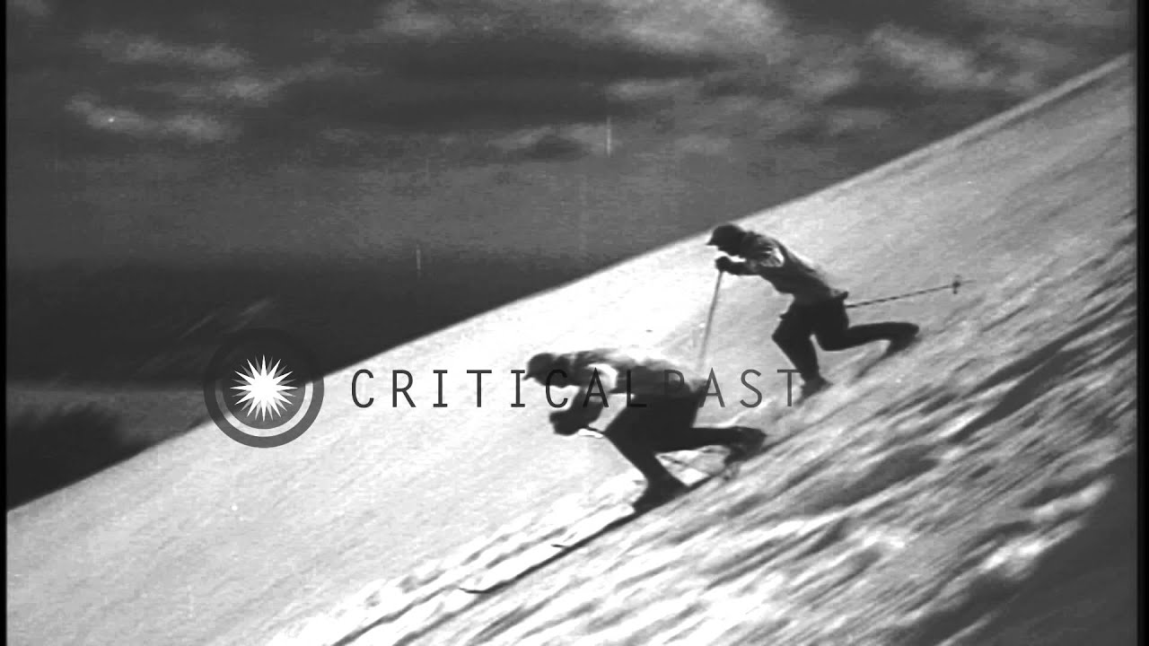 Miniature de la vidéo Men sliding downhill and demonstrating the jump turns and terrain turns in the Un...HD Stock Footage du film The Basic Principles of Skiing