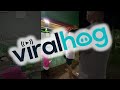 Missed Throw Reveals Someone Sleeping Under Carnival Game || ViralHog