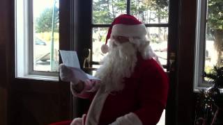 Santa reading the letter
