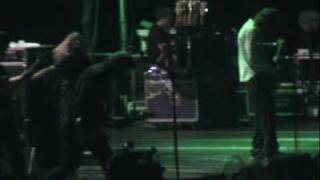 Kim Gordon dancing in concert of Sonic Youth (2009)