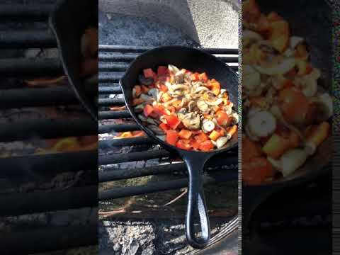 Cooking on the fire ring in the campground 