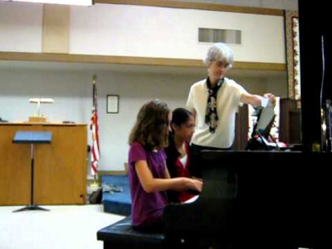 Malika and Natalya playing "Straw Hat Strut"