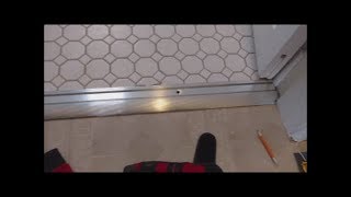 how to install threshold on bathroom doorway