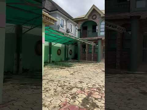 Hotel on 5 plot of land for sale @ igando very close to main road lasu express .