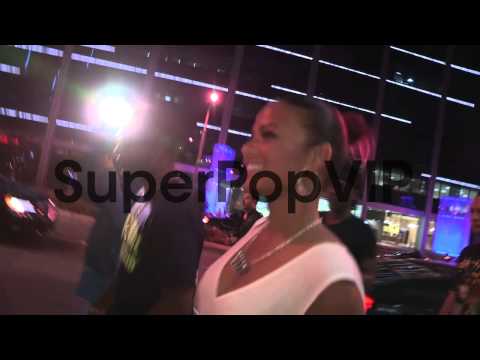 Christina Milian on her Baby while greeting and entering ...