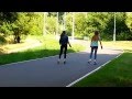 A Couple Of Girls Jeans And Tights On Roller Skates Rides