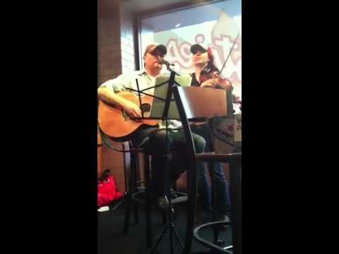 John Rich and his fiddle player Megan Mullins play at Tootsies in the Nashville airport