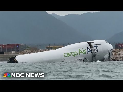 Two killed after cargo plane slides off runway at Hong Kong’s airport