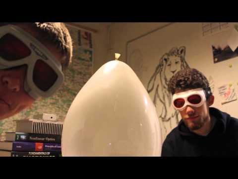 How to light a match inside a balloon - Smarter Every Day 36 LASER MONTH