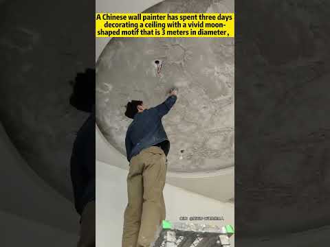 Moon at home! Chinese wall painter spent three days decorating a ceiling with a moon-shaped motif