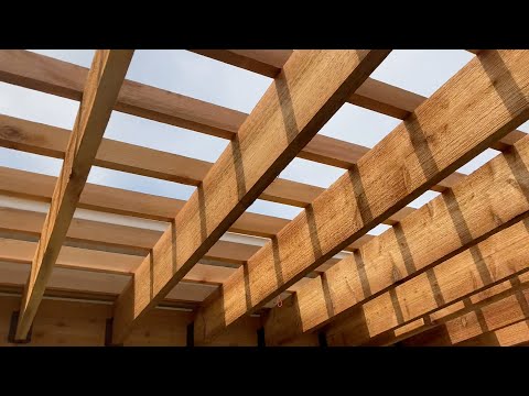 Pergola ☀️ attaching to house 🏠 , and privacy panels.  #pergola #cedar #backyard