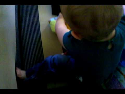 June Singing in Her PLay Pen