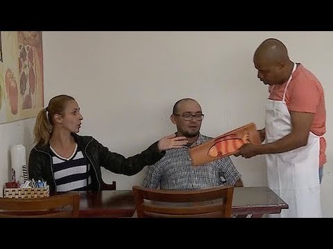 Waiter offers "fish on a tile" and leaves customers outraged.