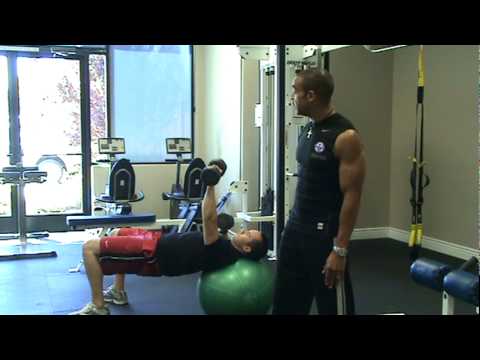 Alternating Dumbbell Chest Press on a Swiss Ball