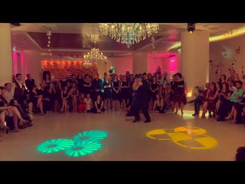  Adrian Veredice  and  Alejandra Hobert  are  dancing  to  the  tango  "  Indiferencia  "  by  Juan D'Arienzo  in  2020
