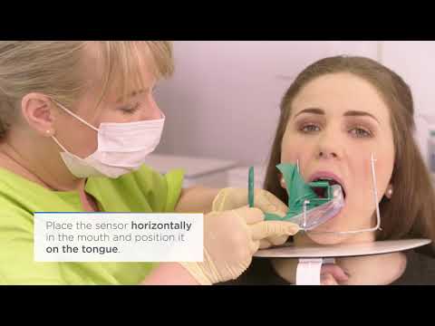 Intraoral Sensor Positioning with Endofile and Rubber Dam