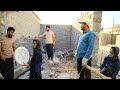ChatGPT0 Show The Man Installing The Clock On The Wall And The Woman Watching