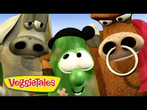 Close-up of three animated VeggieTales characters smiling, with a green vegetable in the center and the logo in the bottom-left corner.