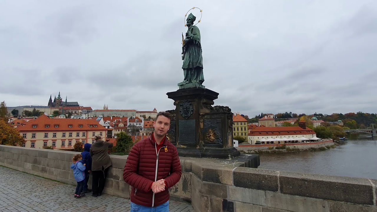 A traveler explores Charles Bridge.