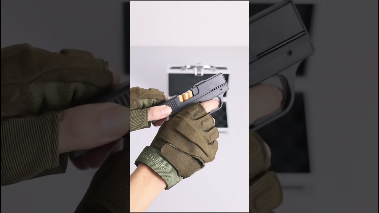 Pistol shaped cigarette case+lighter