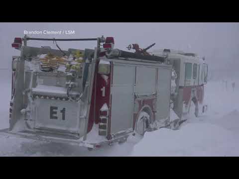 Winter storm pounds part of US, military to enforce driving ban in Buffalo, looters hitting stores