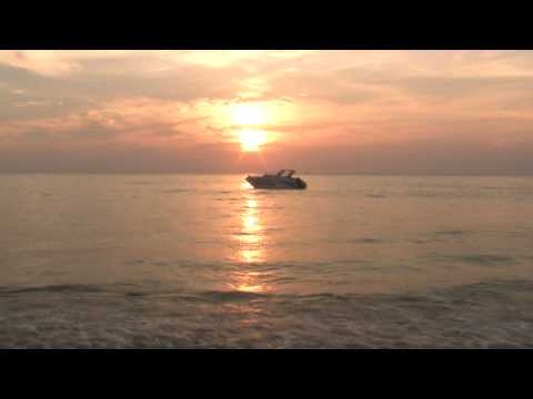 закат на пляже Карон