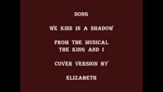 WE  KISS  IN  A  SHADOW    ( ELIZABETH  COVER )