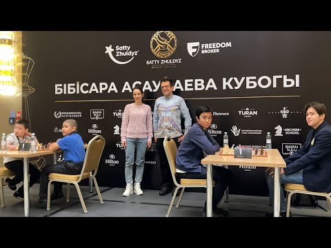 Grandmasters Levon Aronian and Kateryna Lagno make the ceremonial moves | Bibisara Assaubayeva Cup