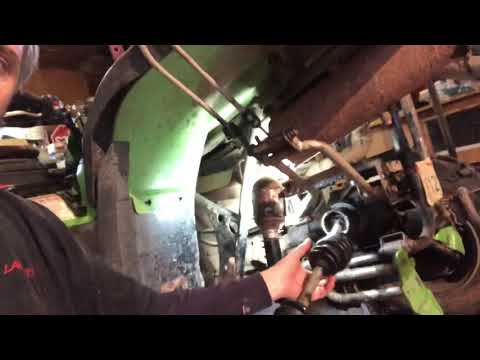 How to remove axel from 2005 Arctic cat 400 4x4