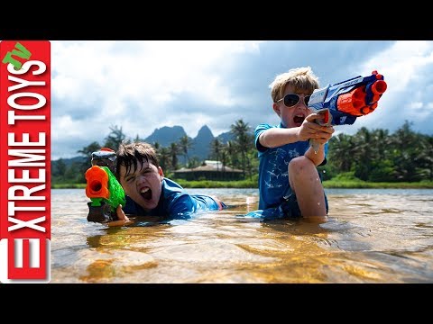 Nerf Battle With Jungle Creatures! Sneak Attack Squad Mayhem in Hawaii!