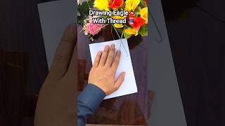 Drawing eagle with thread