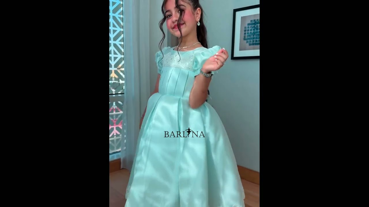 Light blue girly dress adorned with white lace trim - year 1